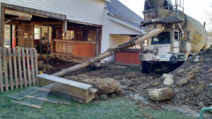 Cement Mixer in Front of Barn